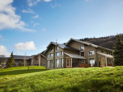 Luxury lodges at Celtic Manor Resort overlooking the golf course in Wales