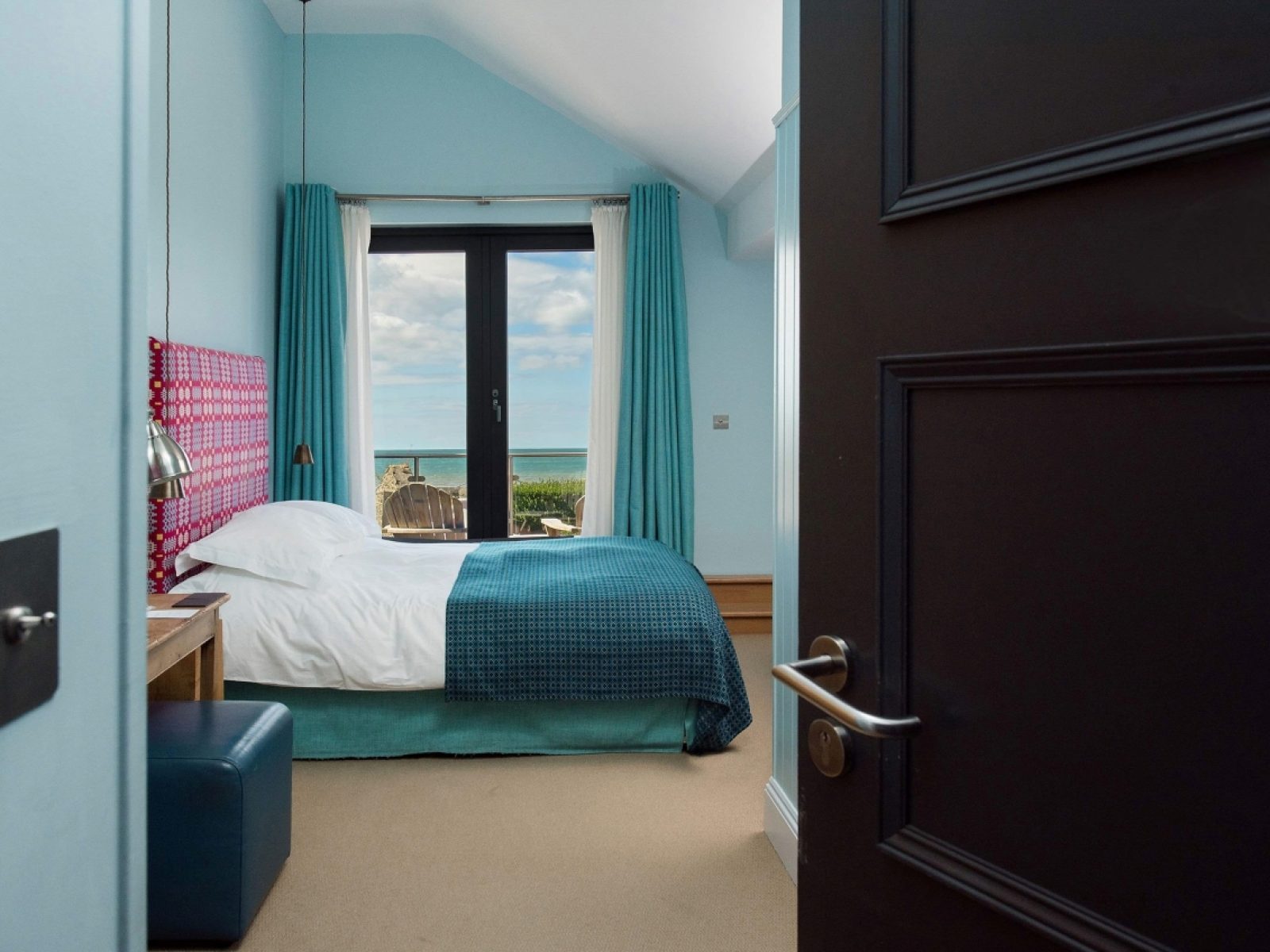 Luxury double bedrooms with sea views across Cardigan Bay at a boutique hotel in Wales
